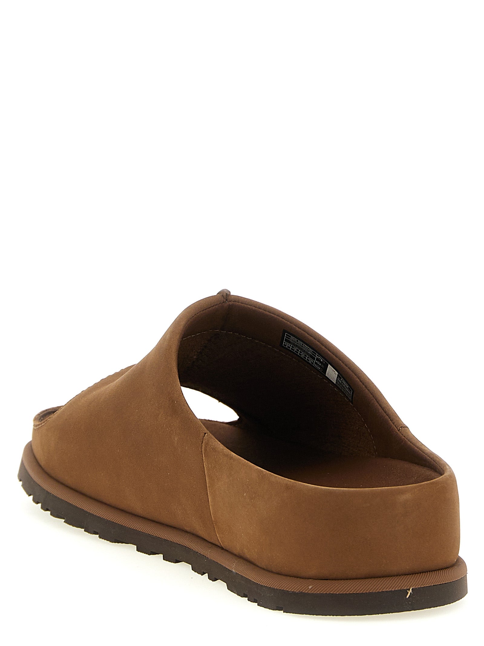 UGG Otzo donkerbruine slide achterzijde met rubberen zoolrand