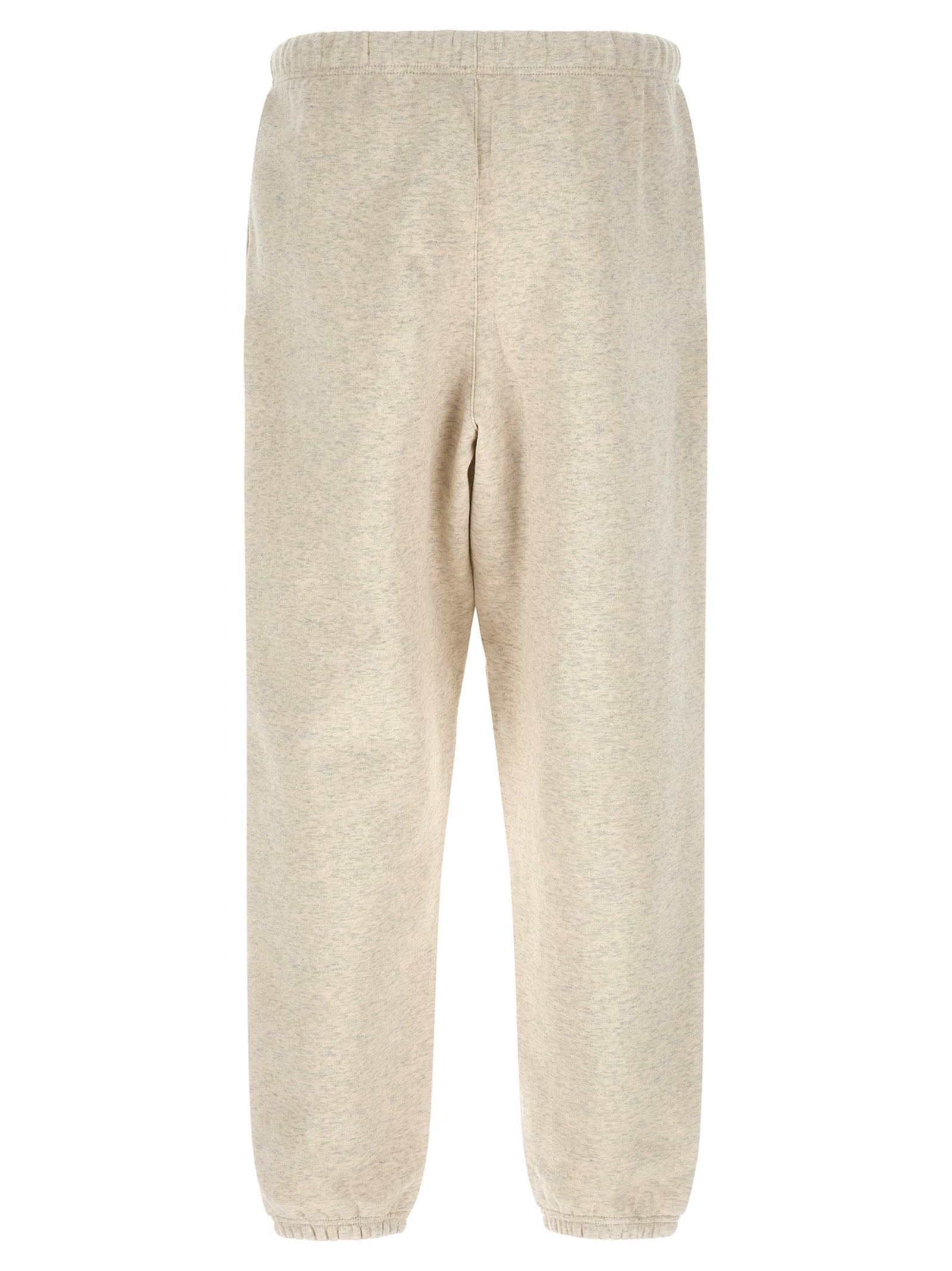Achterkant van de gemêleerd beige Essentials joggingbroek met elastische enkelzoom