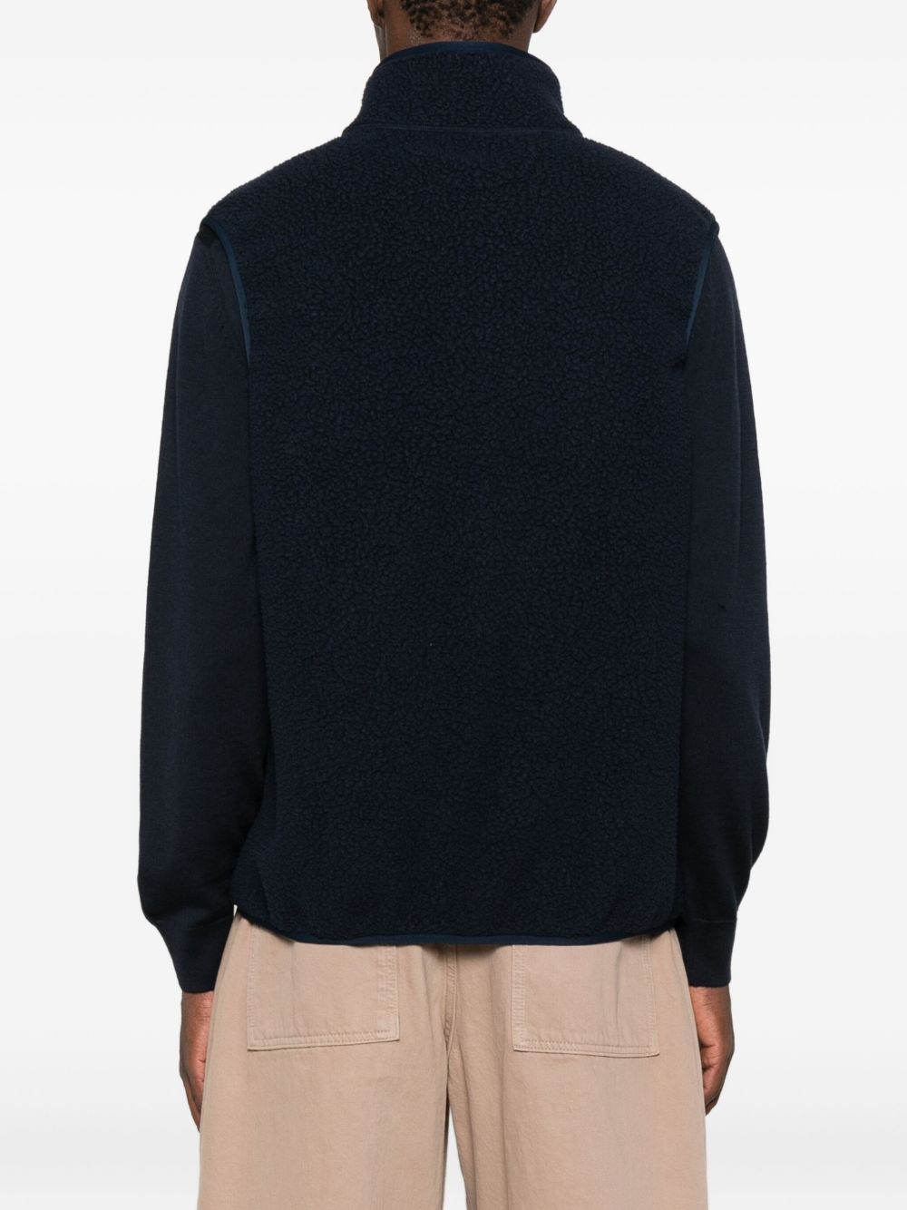 Maison Kitsuné bodywarmer blauw, detail van de fleecetextuur