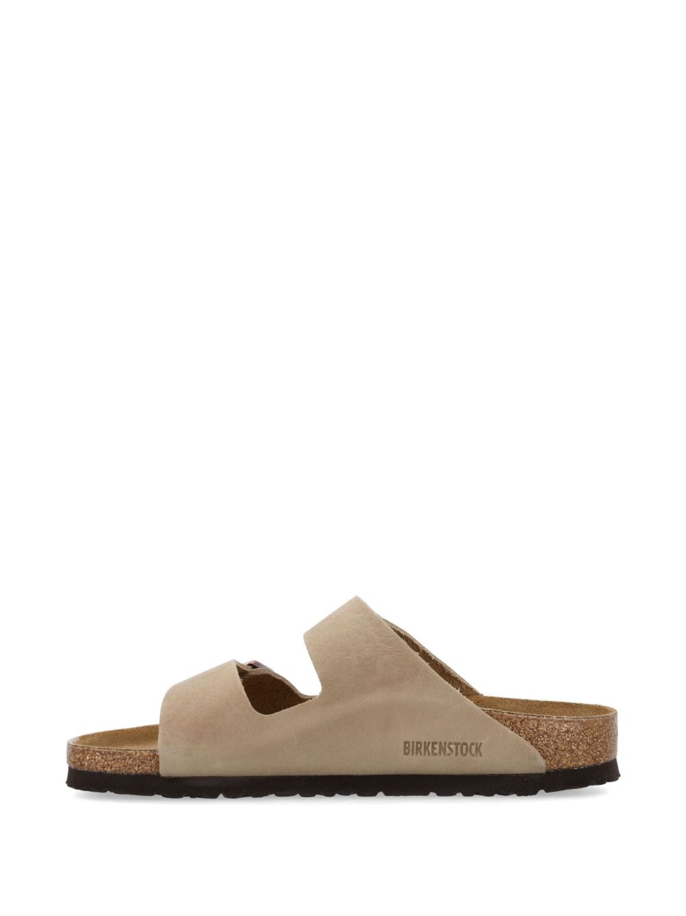 Zijaanzicht met de BIRKENSTOCK-inscriptie op de kurkrand en donkere EVA-zool