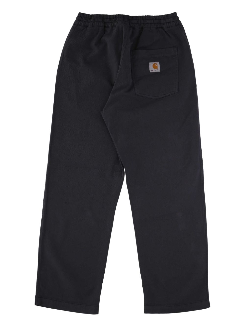 Achterkant van de broek met opgestikte achterzak en geweven Square Label