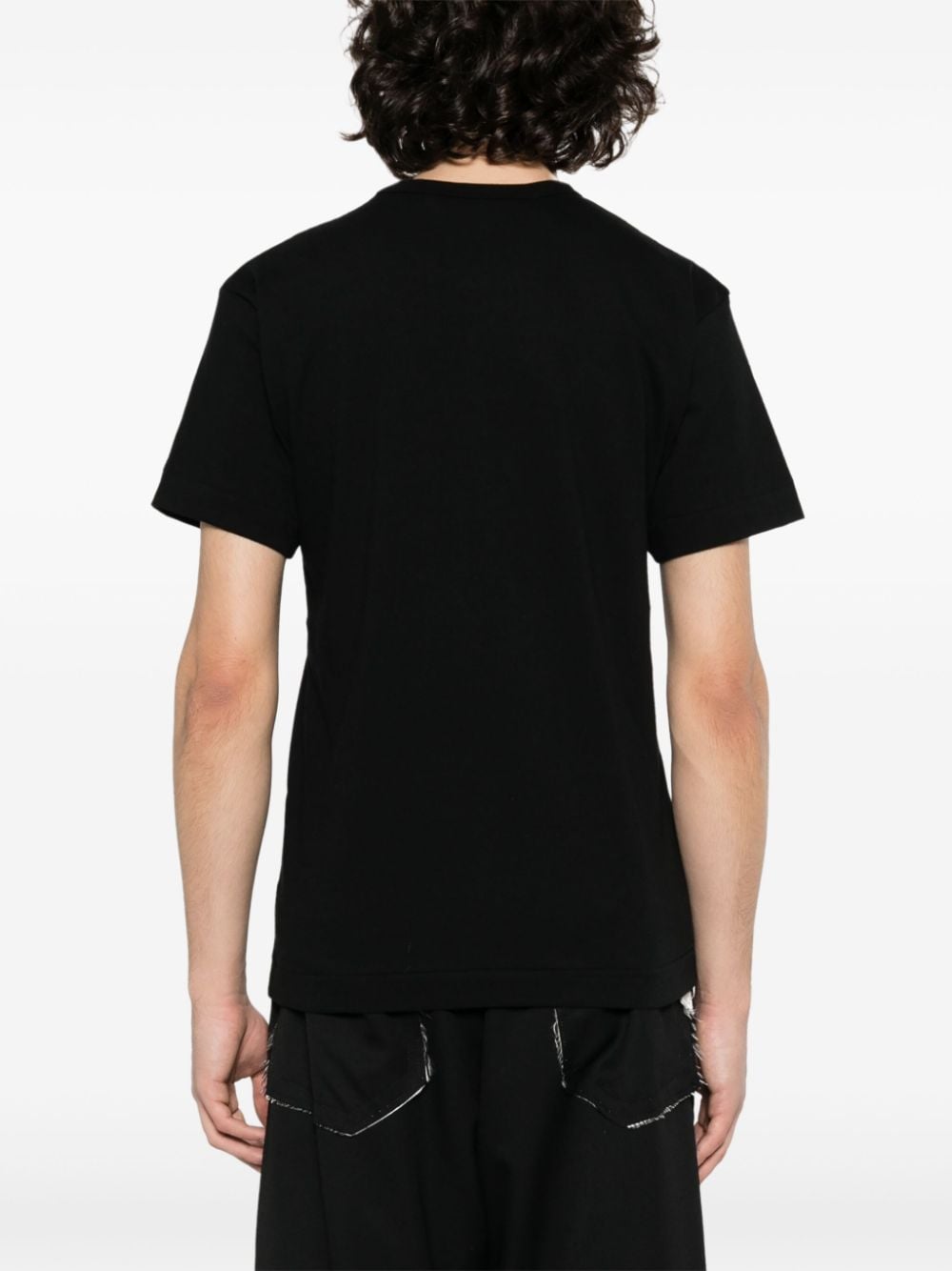 Achteraanzicht van het zwarte PLAY T-shirt, effen zonder embleem