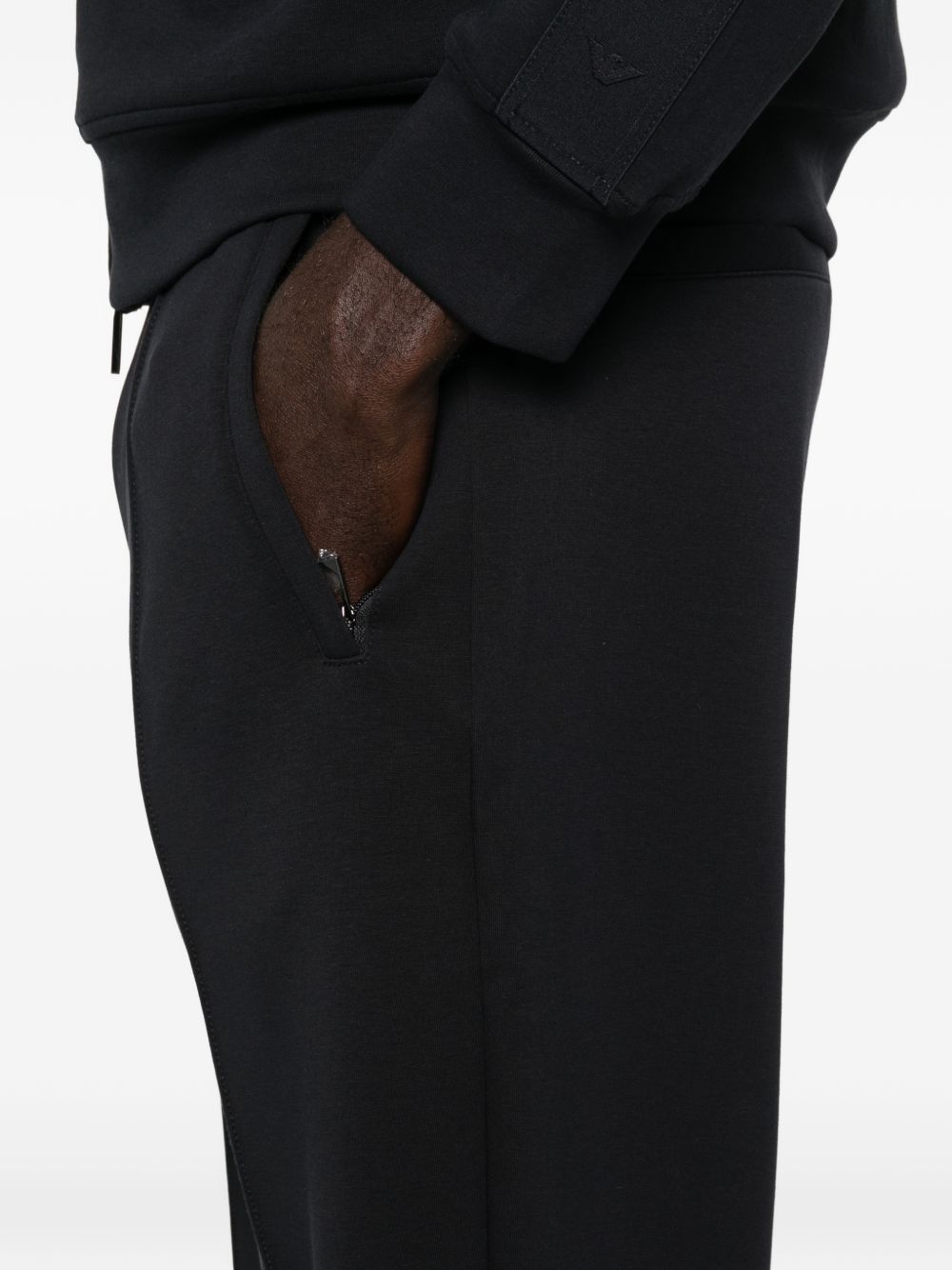 Emporio Armani Essential Sweatpants met Gestikte Naden Zwart Trousers Emporio Armani