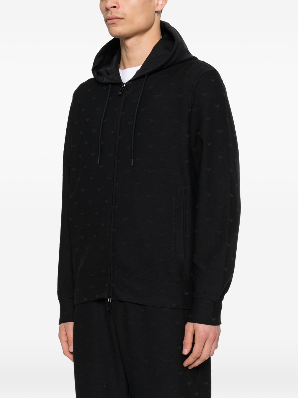 Emporio Armani Travel Essential Hoodie met All-Over Logo Zwart Topwear Emporio Armani