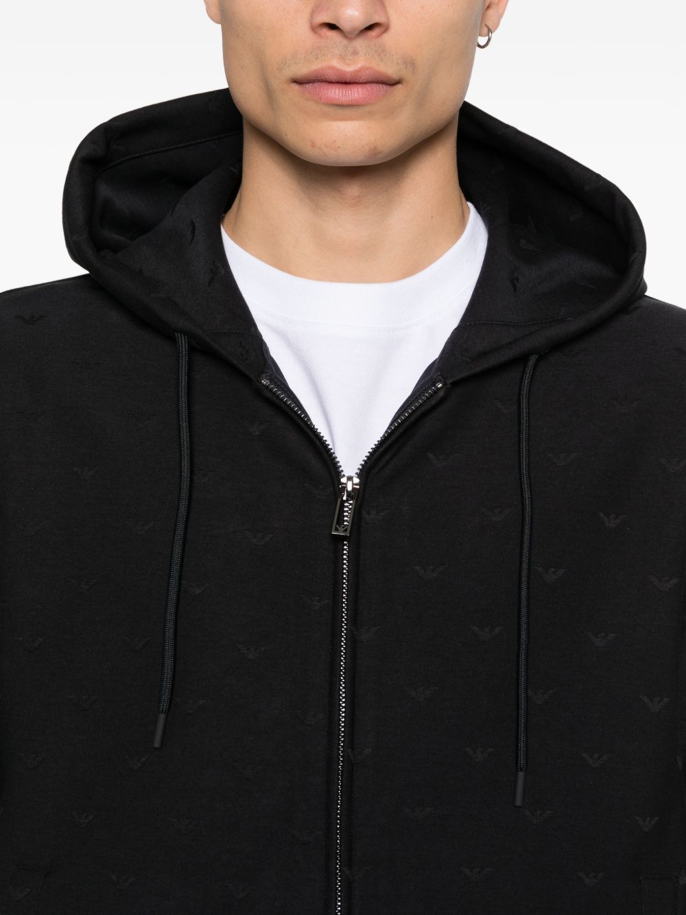 Emporio Armani Travel Essential Hoodie met All-Over Logo Zwart Topwear Emporio Armani
