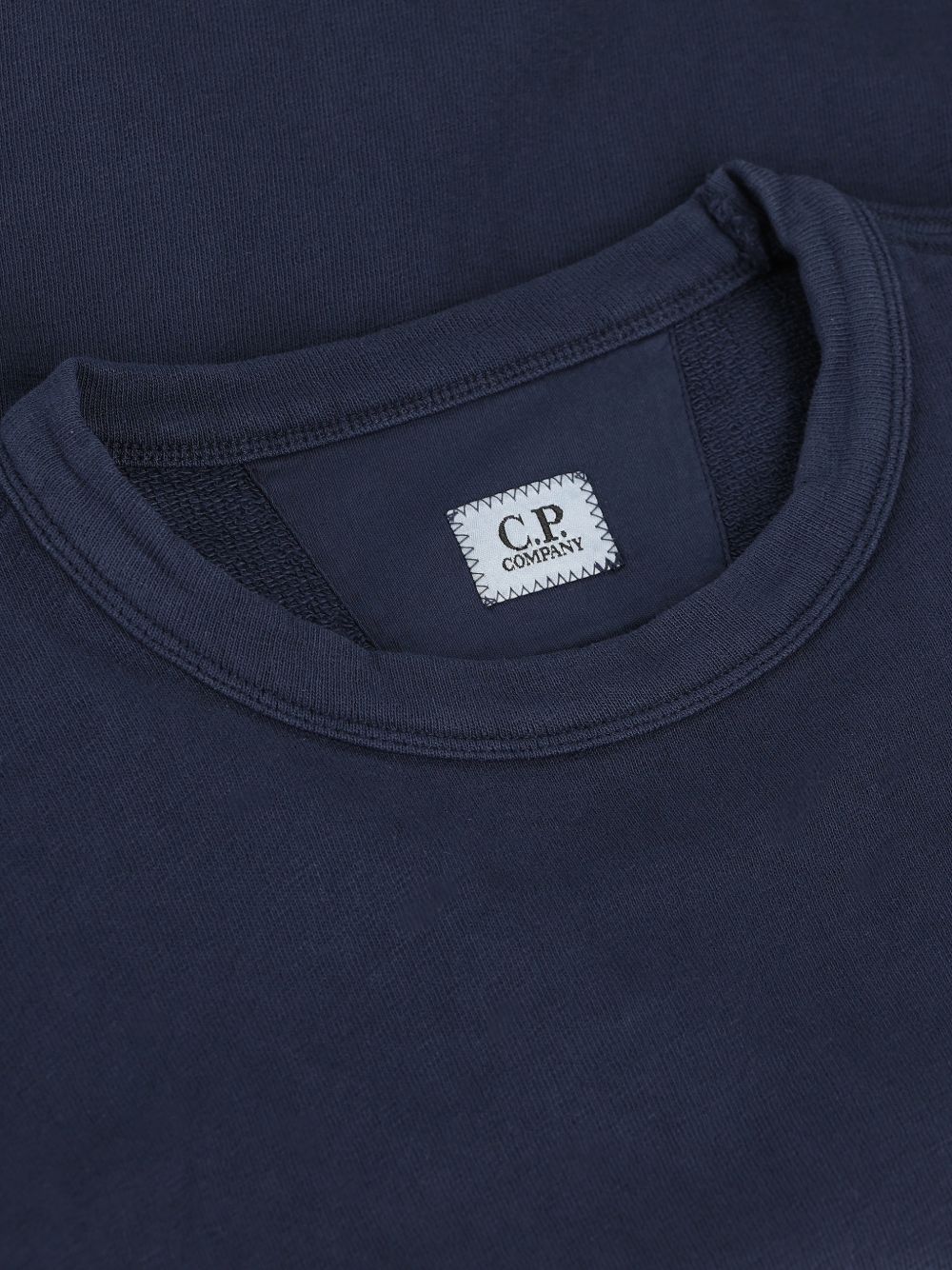 C.P. Company Diagonal Raised Fleece Lens Sweater Blauw Topwear C.P. Company