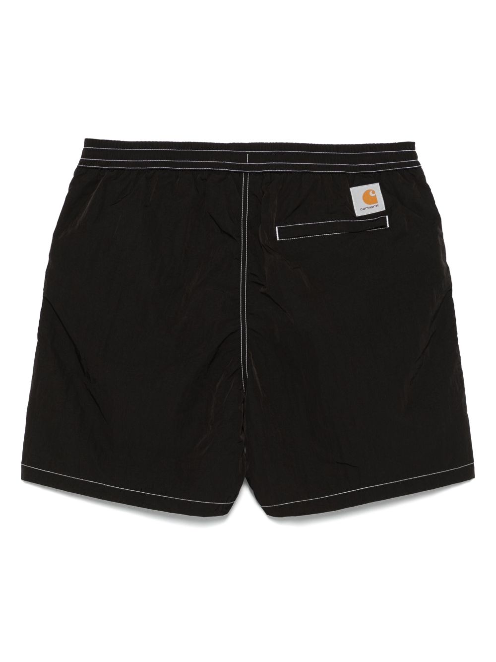 Achterkant van de zwembroek met paspelzak en vierkant Carhartt-label
