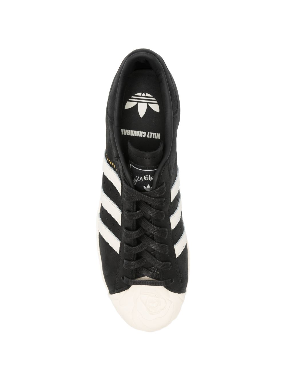 Adidas x Willy Chavarria Superstar sneaker core black - achteraanzicht met Gold Metallic-accenten