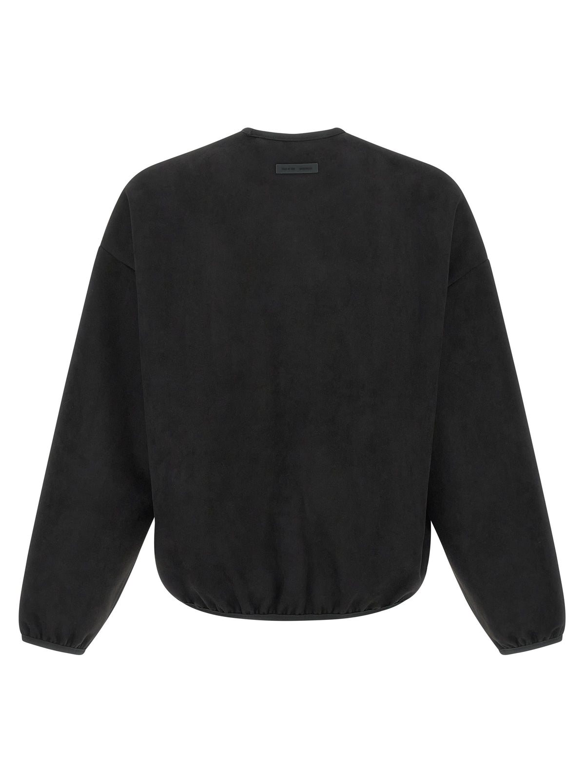 Achterzijde van de zwarte crewneck met label in de hals en elastische zoom