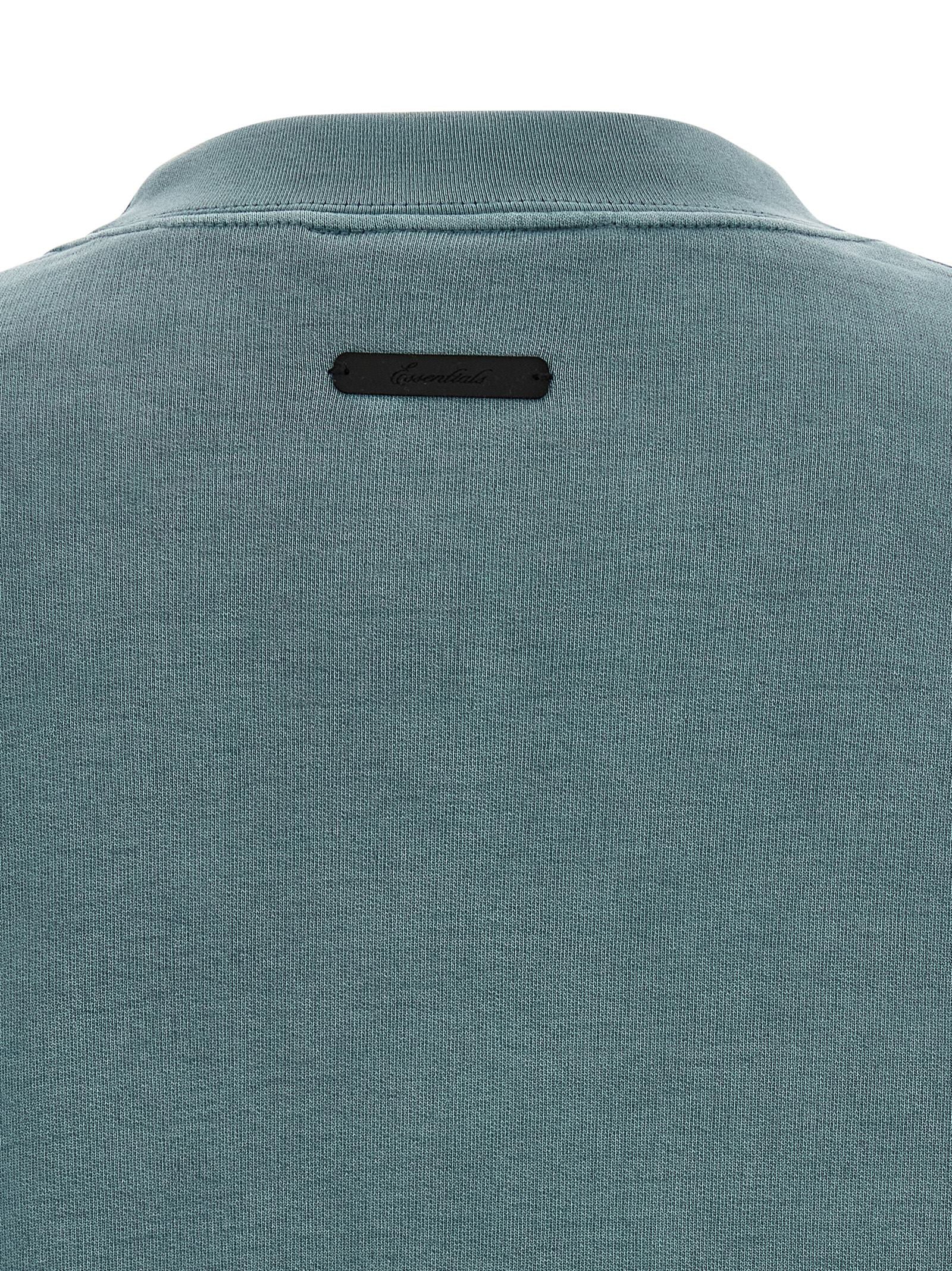 Detail van de geribde zoom van het Faded Coastal Campus 90s sweatshirt