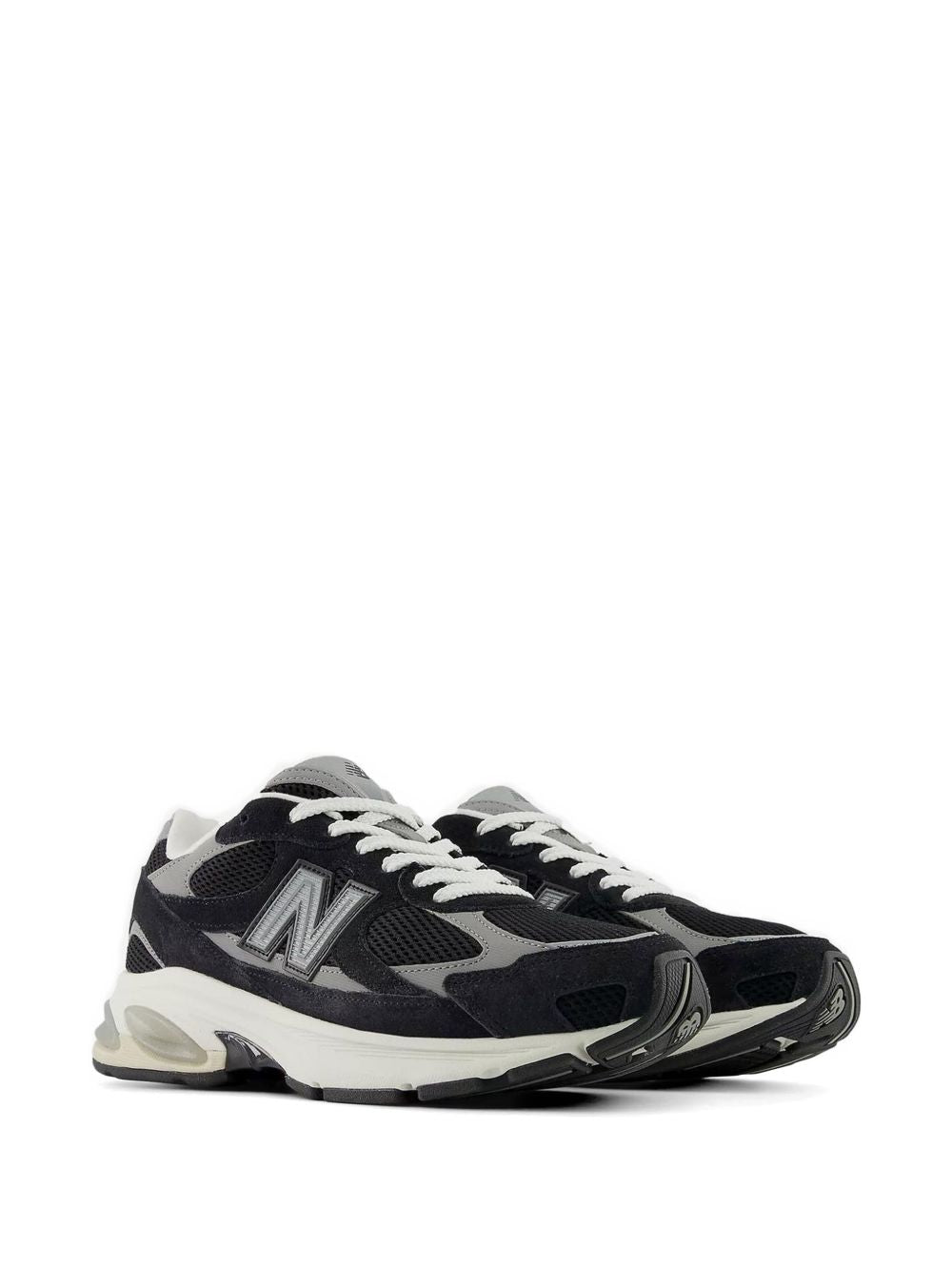 New Balance 2010 sneaker in zwart met grijze accenten, detail zool en tussenzool