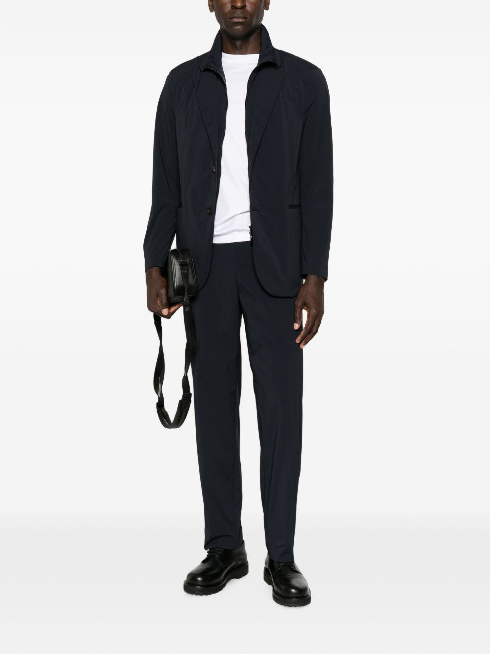 Paspelzak op het navyblauwe Emporio Armani colbert