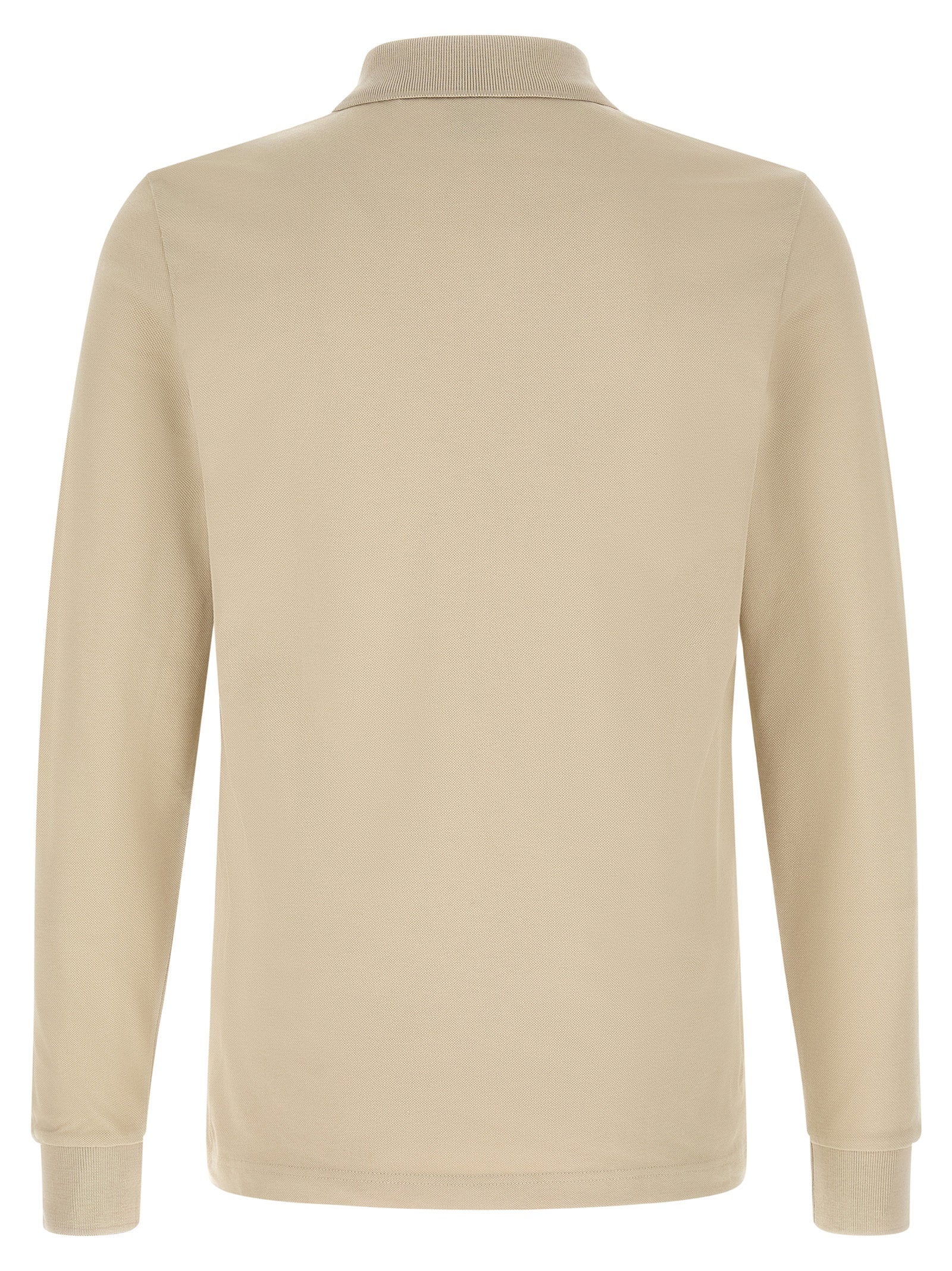 Hugo Boss Passerby polo in ecru, close-up van het tone-on-tone logo op de borst