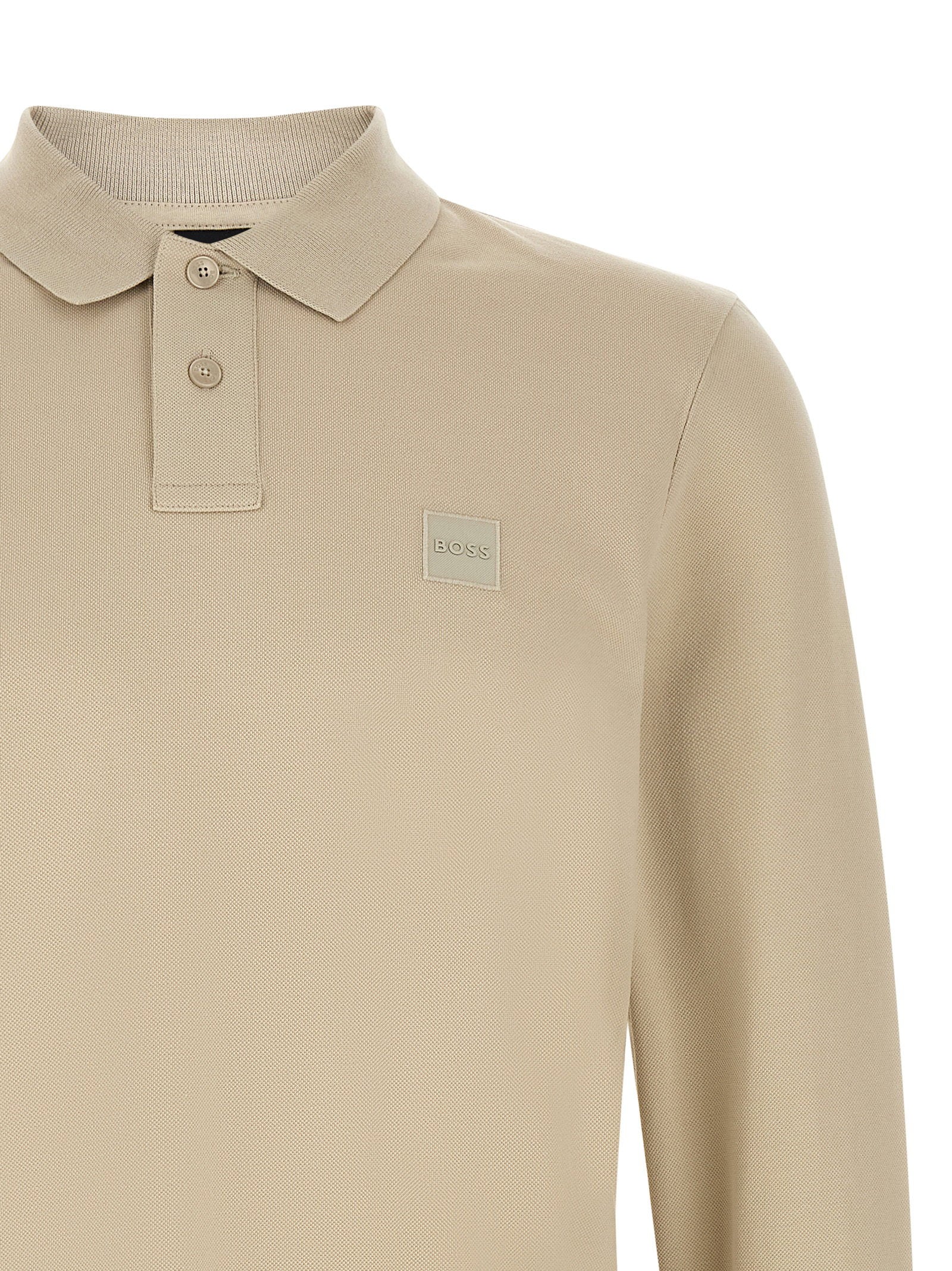 Hugo Boss Passerby polo in ecru, detail van de geribde manchet