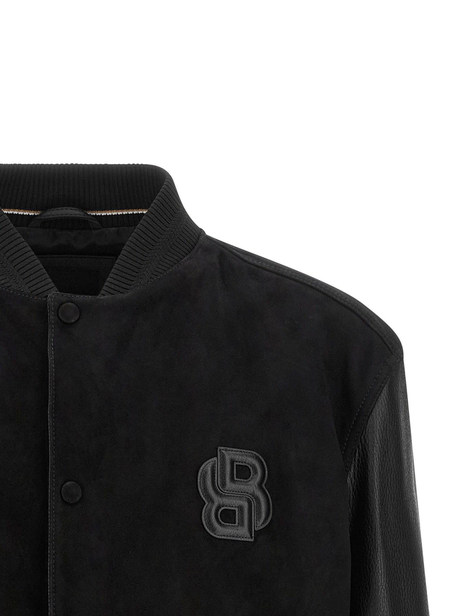 Hugo Boss varsity bomberjack in zwart met leren mouwen, detail van de reliefkorrel op het leer