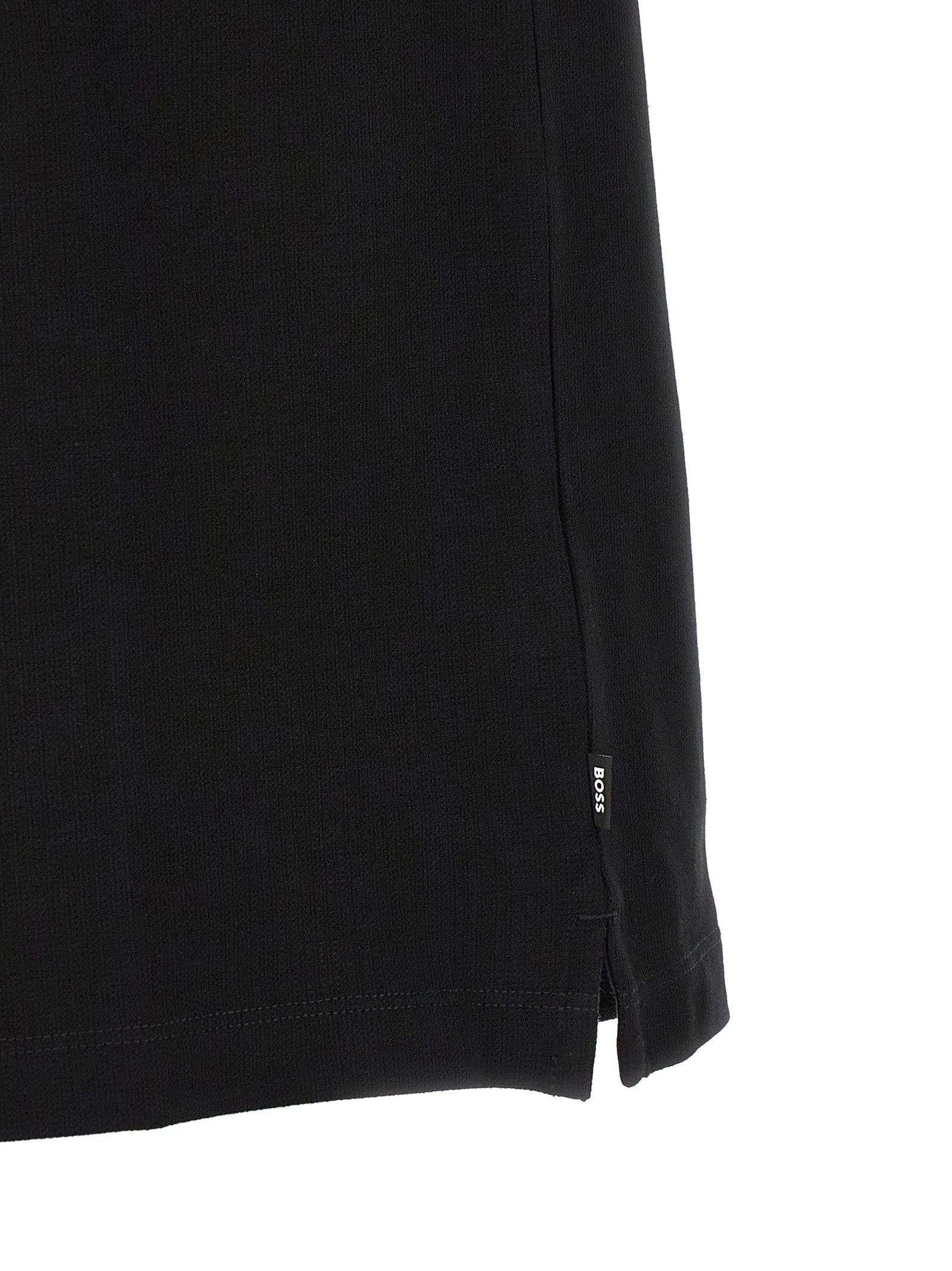 Hugo Boss C-Pei 90 poloshirt in zwart, achteraanzicht op model