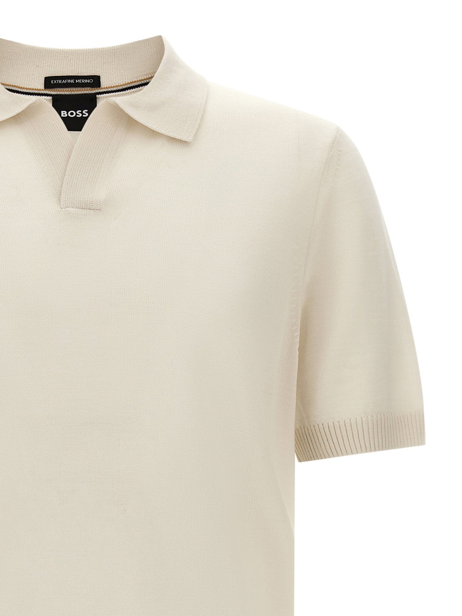 Hugo Boss Lantoni merino wollen polo crème, detail van het logolabel op de zijnaad