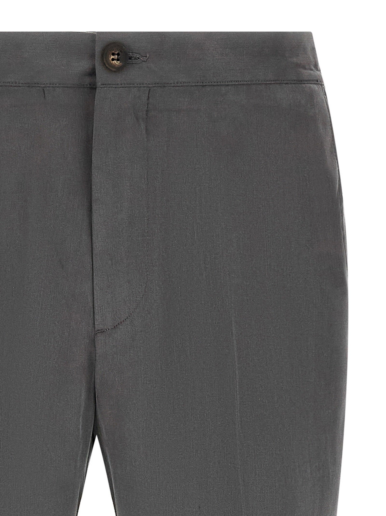 Pal Zileri pantalon detail van tailleband en verlengde persplooi