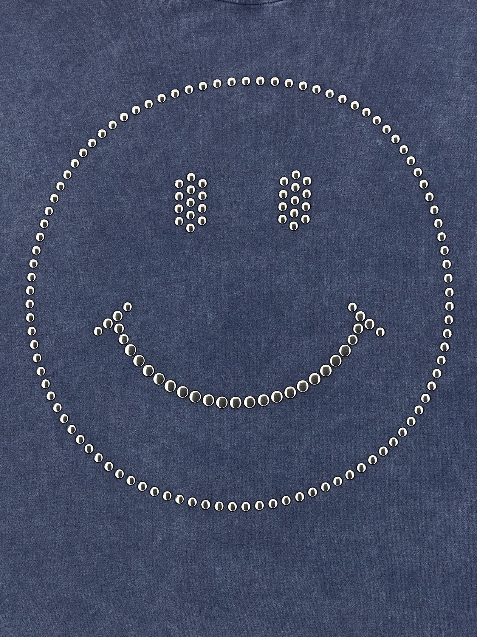 Moschino T-shirt, detail van de délavé stof