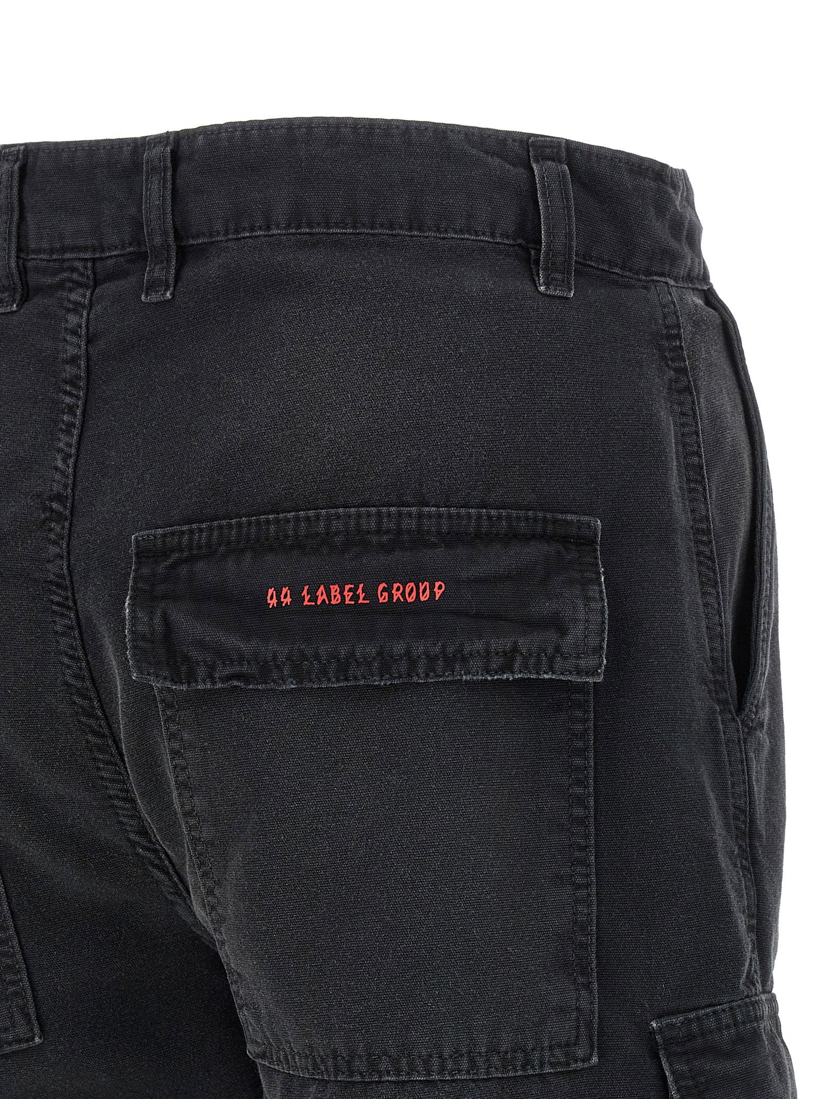 Close-up van de gerafelde zoom van de 44 Label Group Raw Cargo short