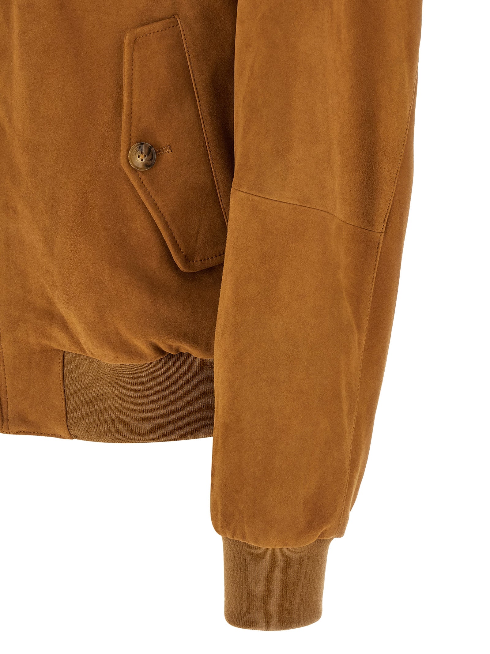 Detail van de zakklep met knoop en de geribde manchet van het Baracuta G9 suède jack
