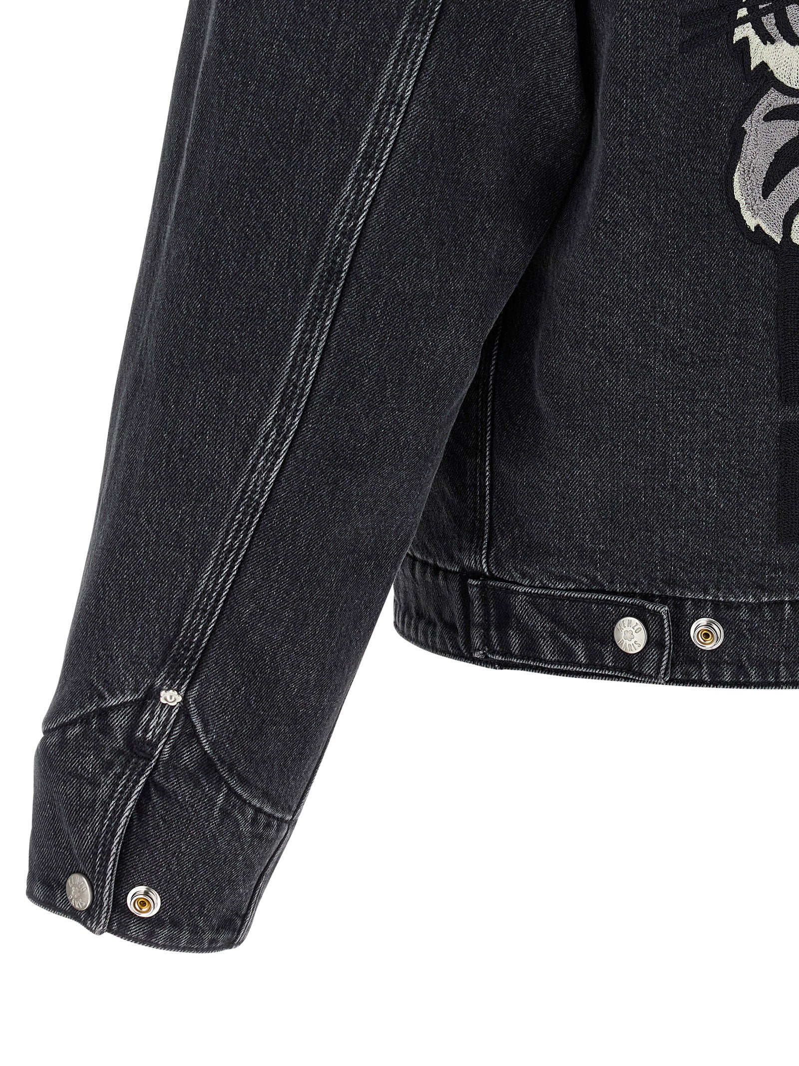 Close-up geborduurde graphic Kenzo Happy Tiger denim jacket