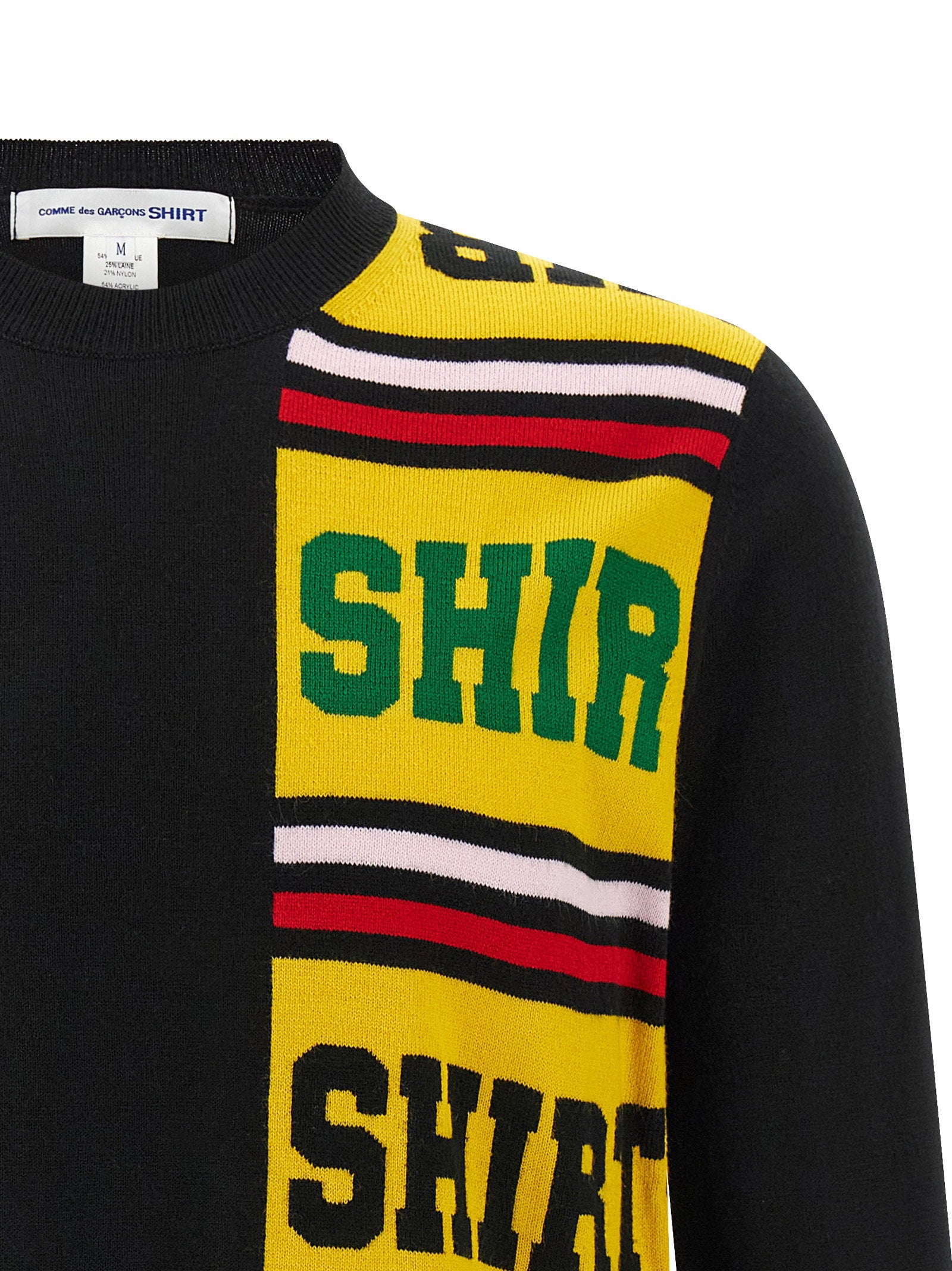 Detailfoto van het intarsia-breipatroon op de Comme des Garçons Shirt trui
