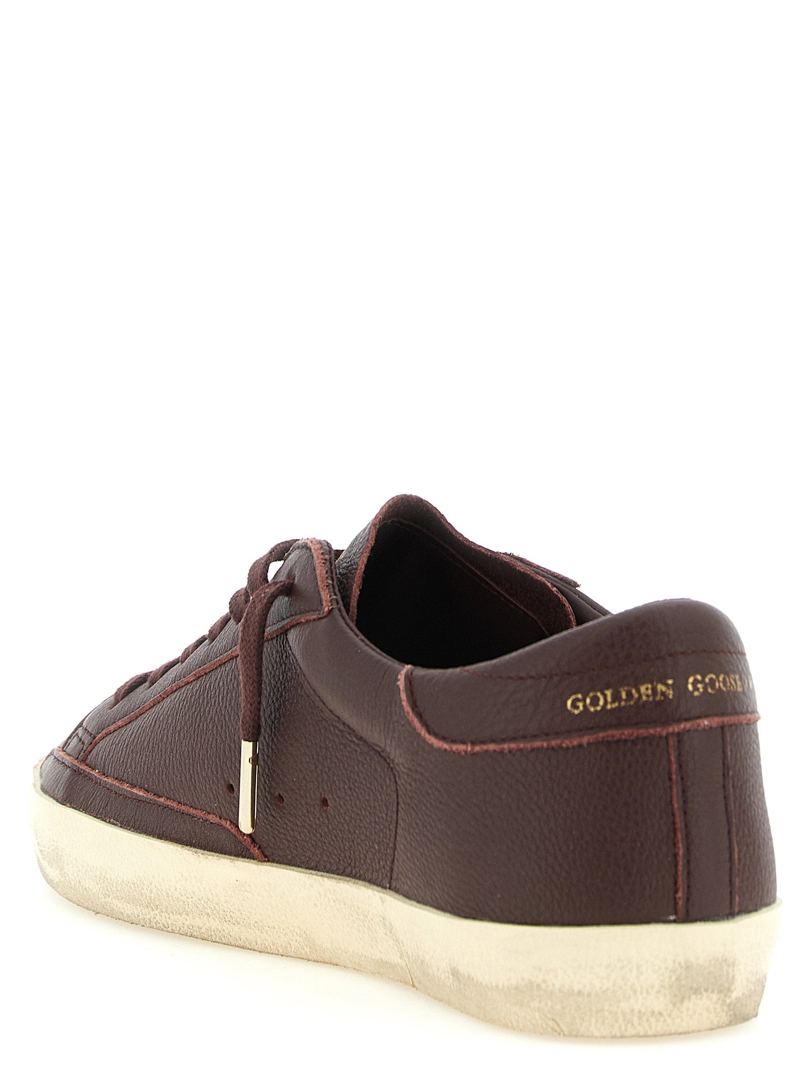 Golden Goose Super-Star sneakers bordeaux, detail van de gouden logoprint op de tong