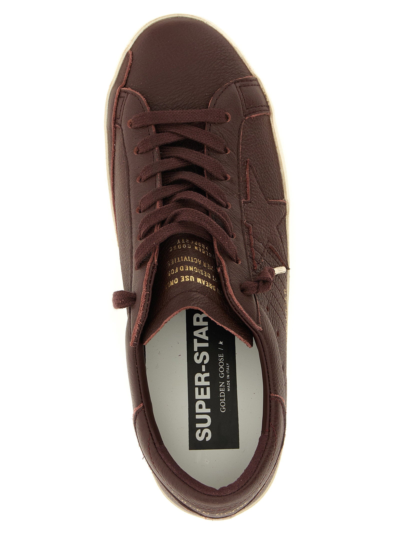 Golden Goose Super-Star sneakers bordeaux, close-up van de verweerde zool