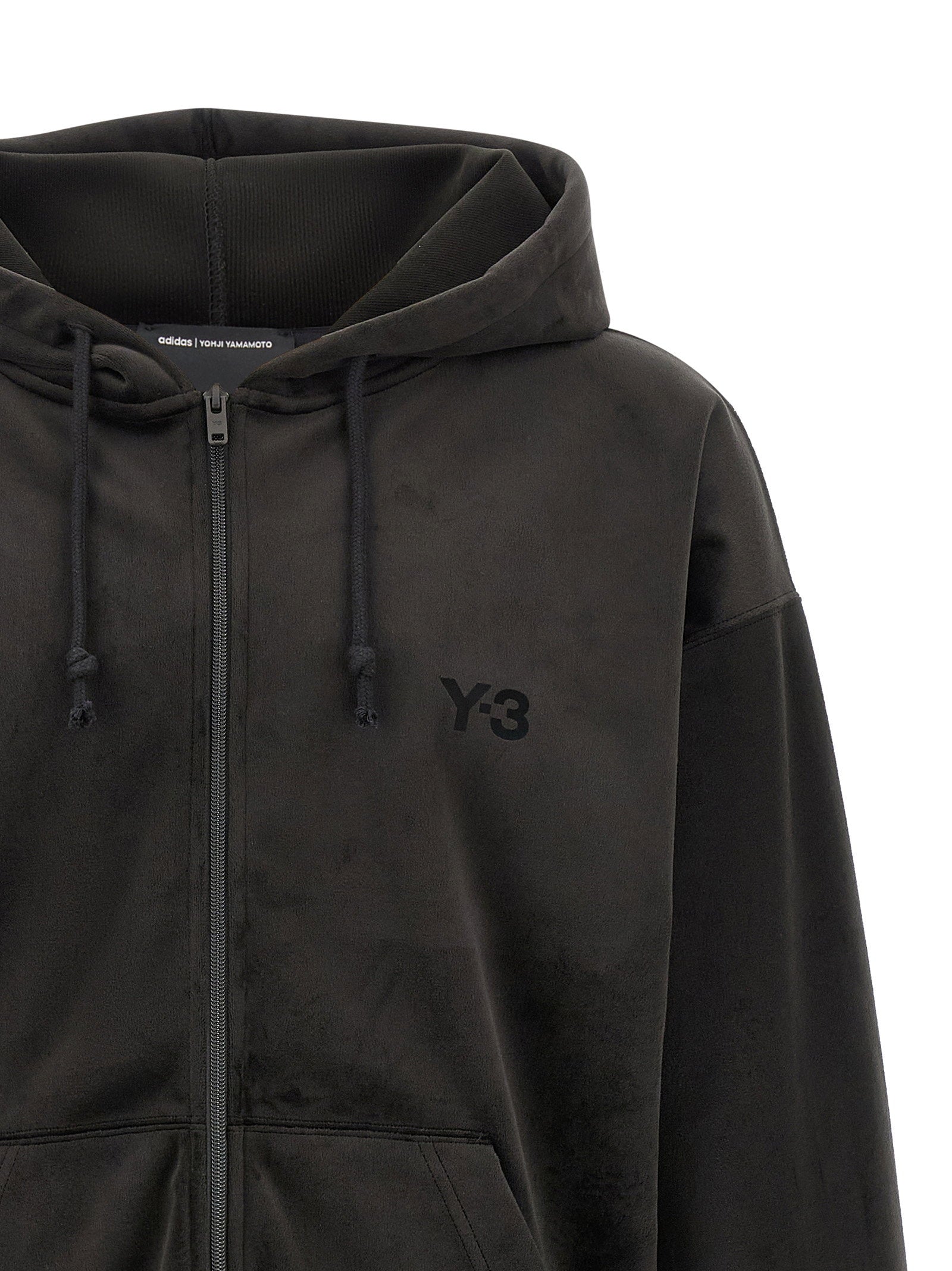 Y-3 Velvet Corduroy Zip Hoodie in zwart, detail van rits en ribboorden