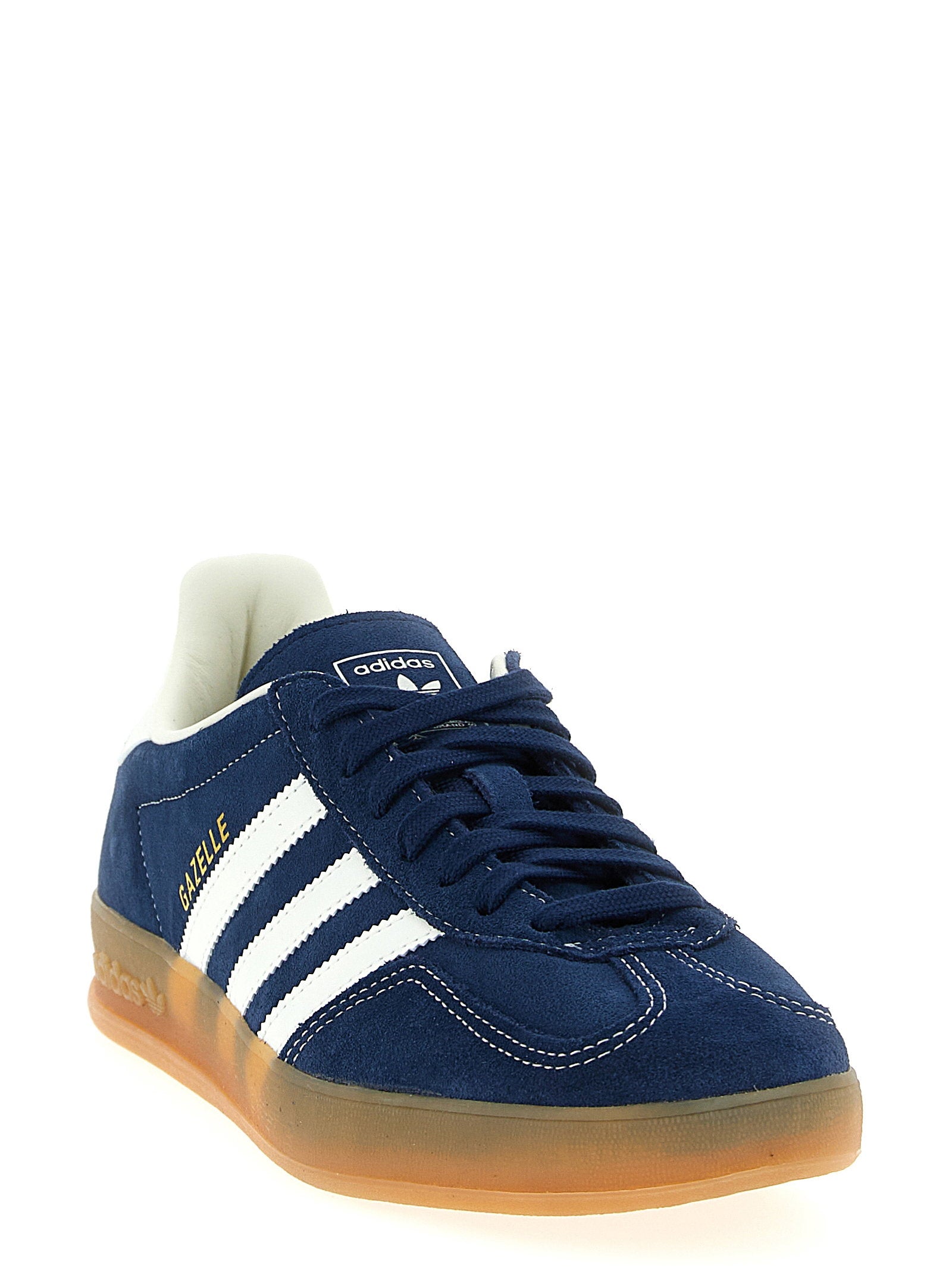 Witte leren details en contrasterende stiksels op de Gazelle Indoor