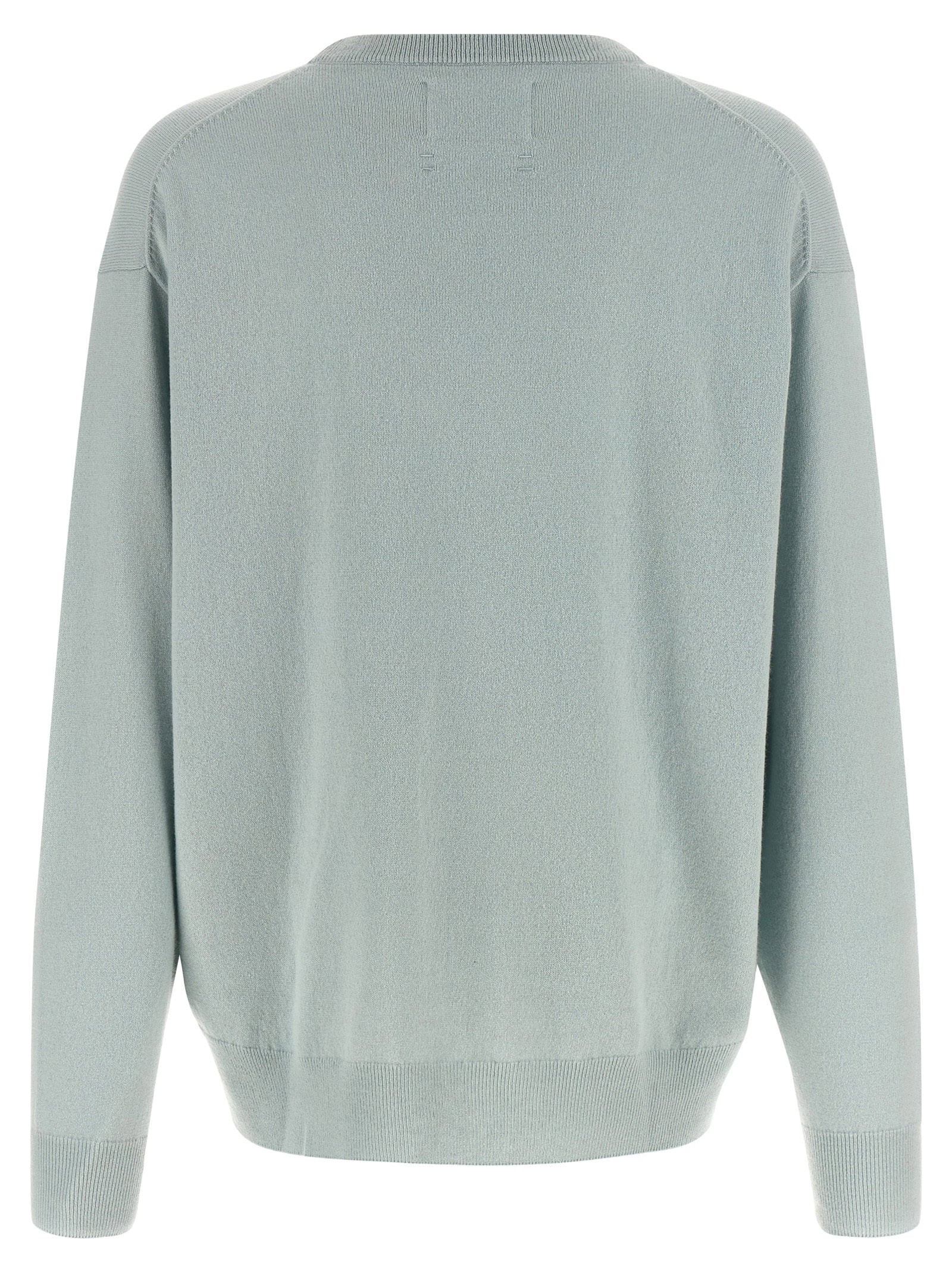 Extreme Cashmere N°476 April trui lichtblauw, detail van gestreepte manchet