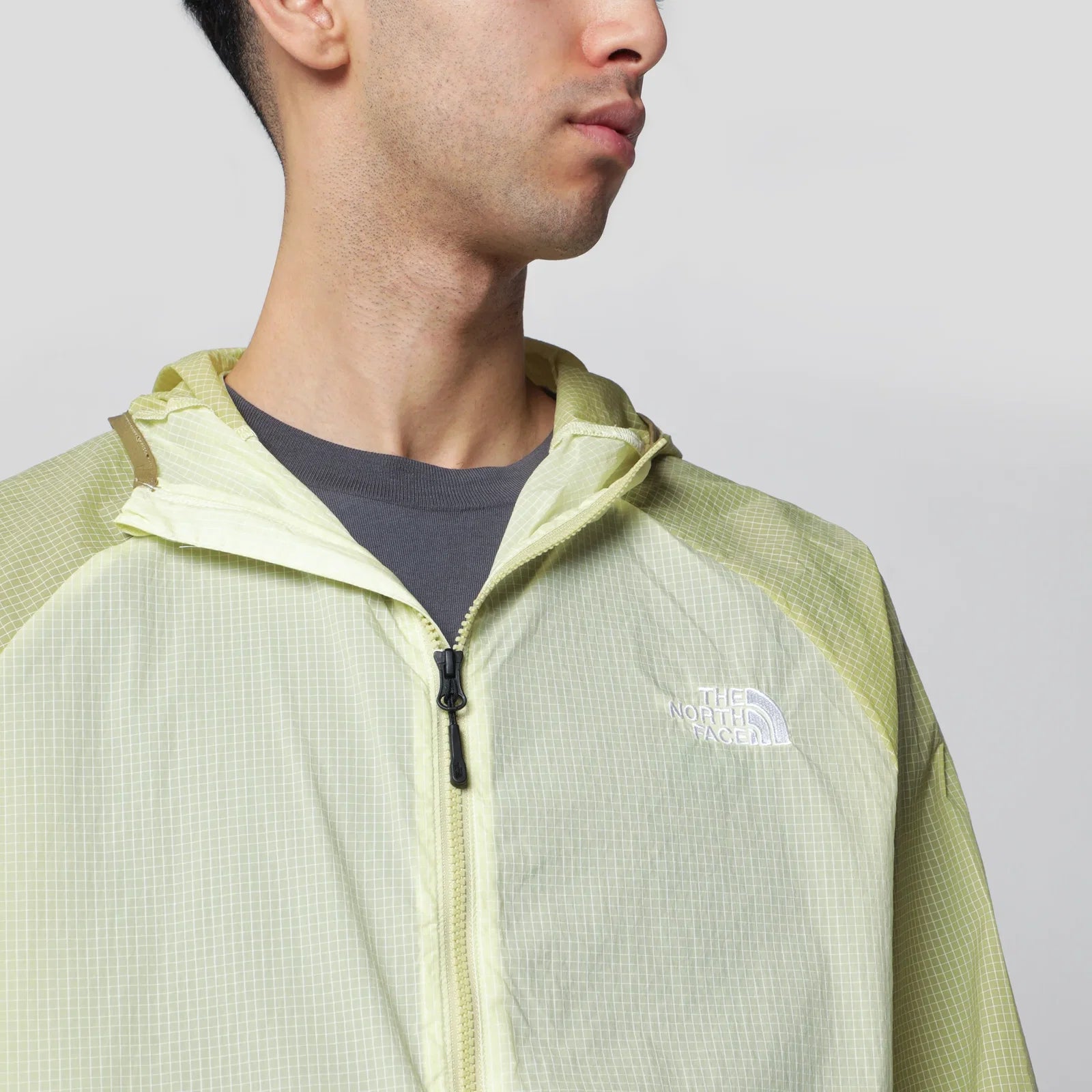 The North Face Lemon yellow NSE windbreaker jacket Jackets The North Face
