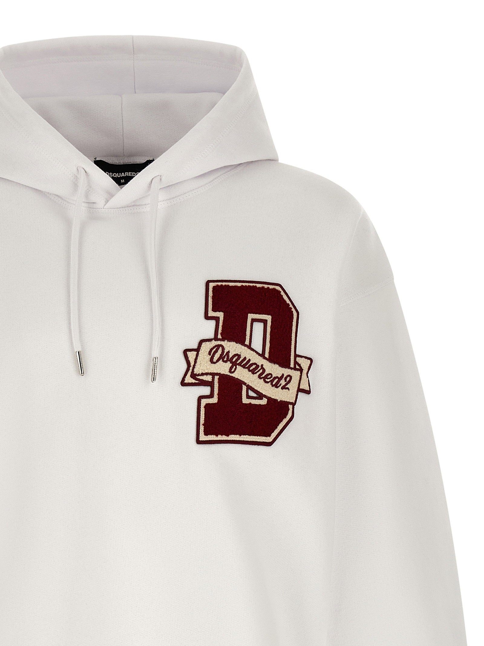 Zijaanzicht van de witte Dsquared2 hoodie met dropped shoulders