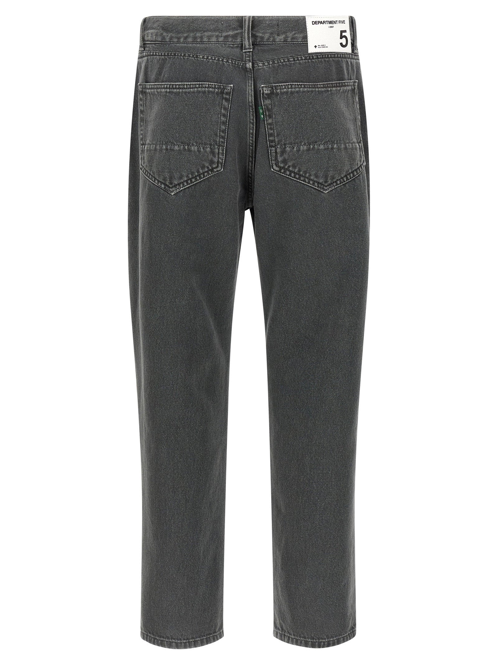 Achterkant van de grijze jeans met opgestikte achterzakken