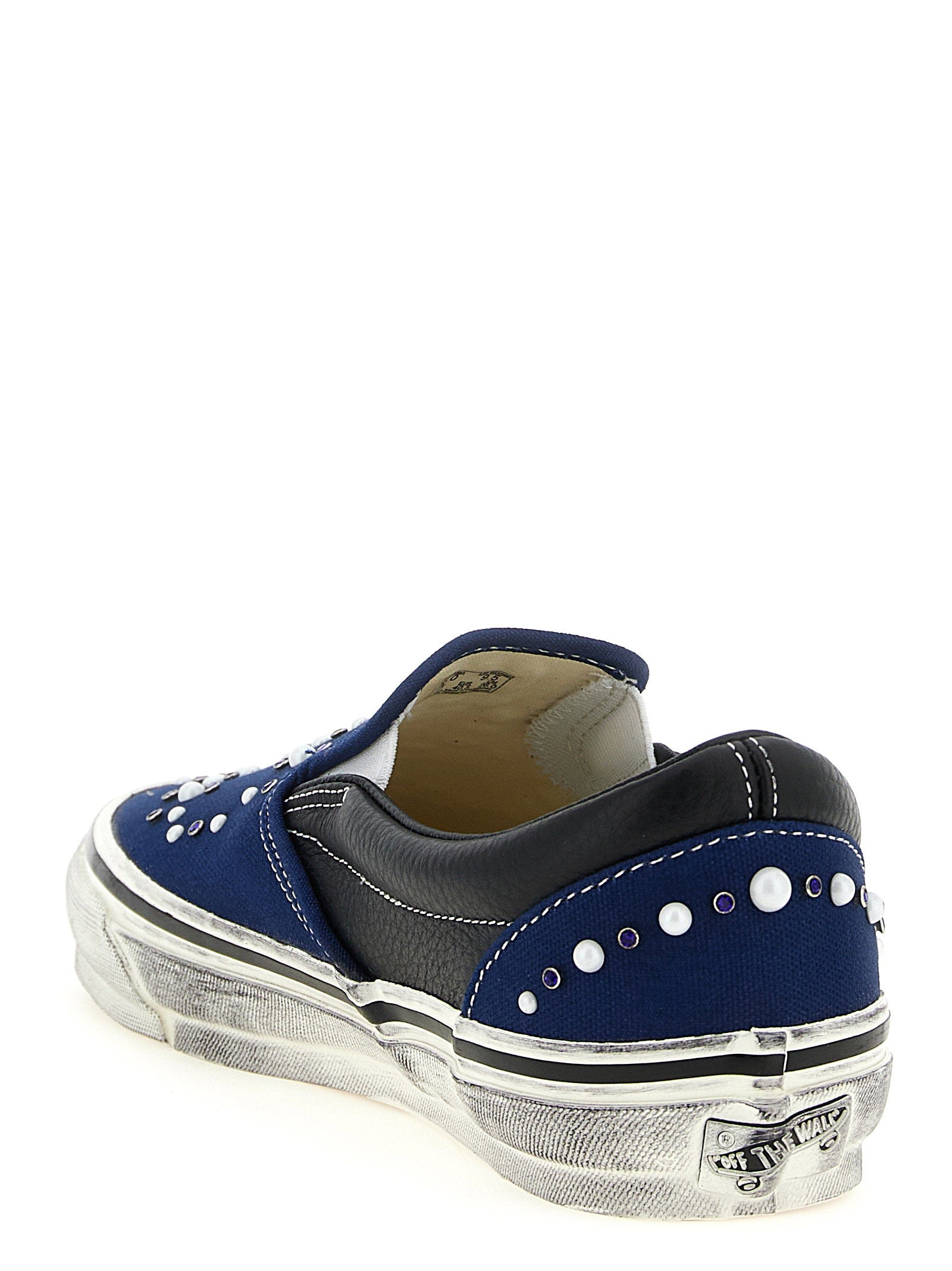 Vans Premium Classic Slip-On sneaker in indigoblauw, detail van de rubberen wafelzool