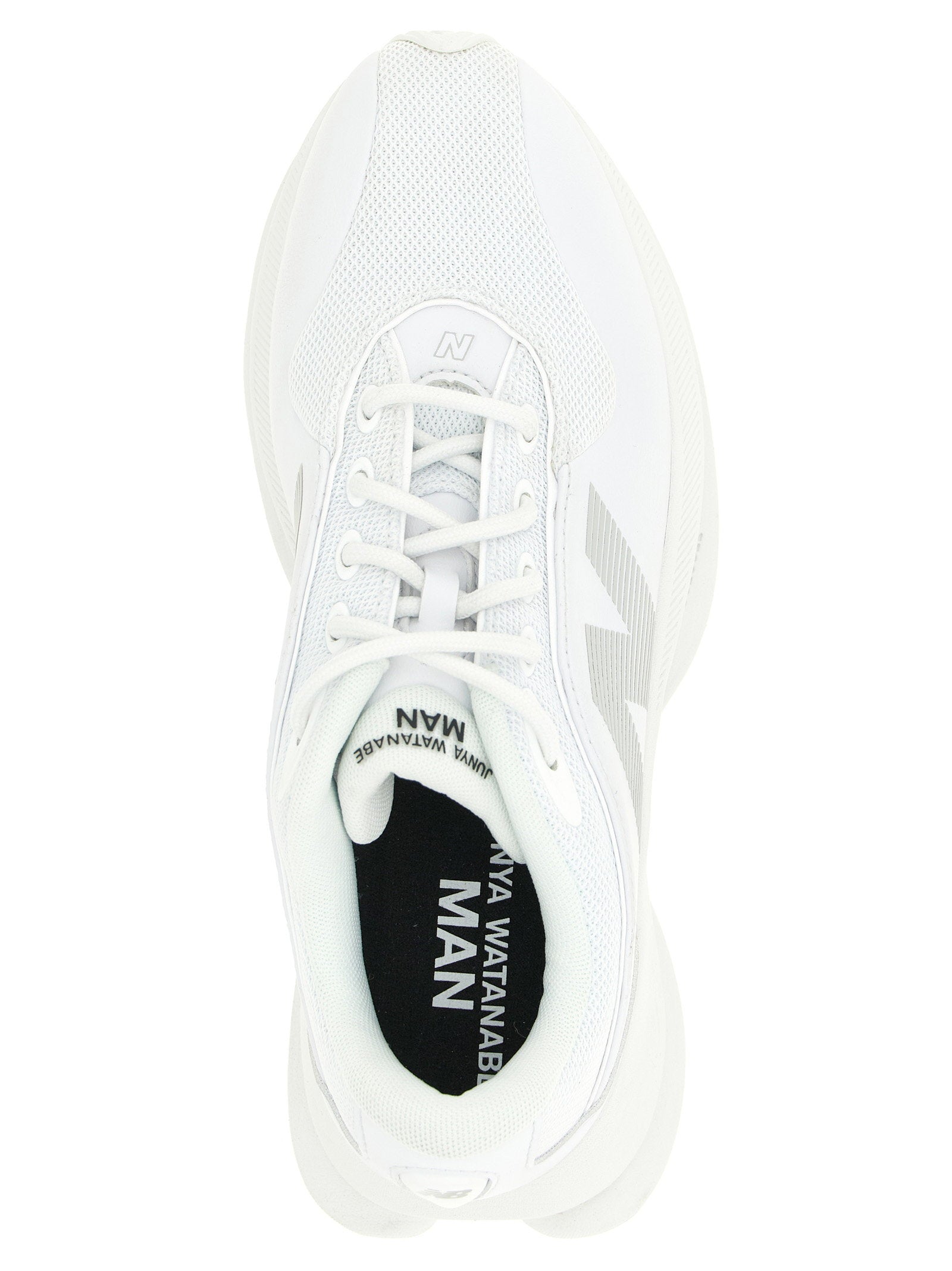 New Balance TF100 sneaker detail van hiel en reflecterende veterogen